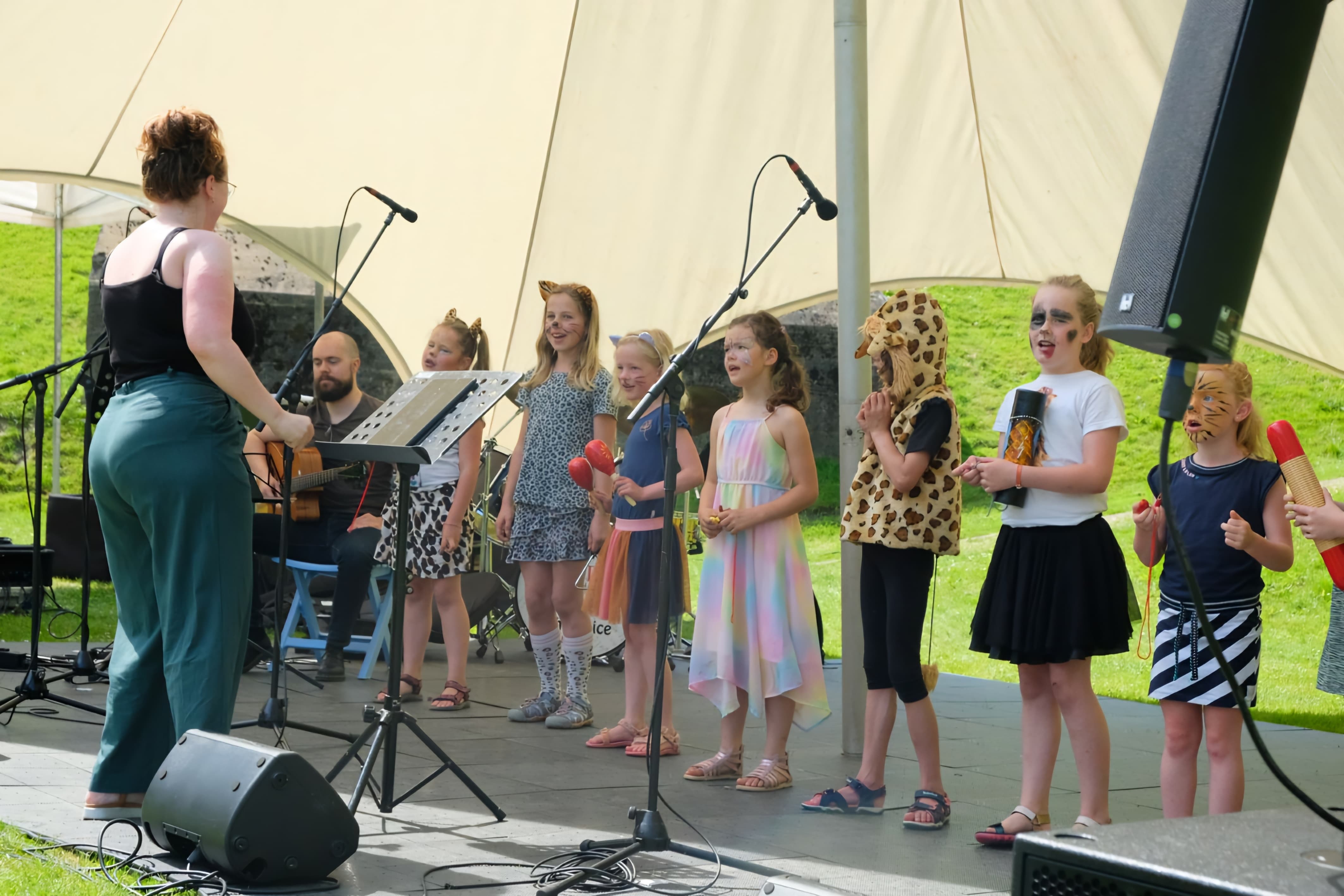 boy singing in microphone